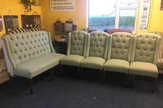 settle and upholstered chairs